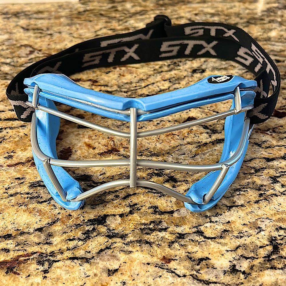 Like new girls lax goggles! A few scratches but in good condition